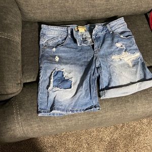 Distressed denim shorts